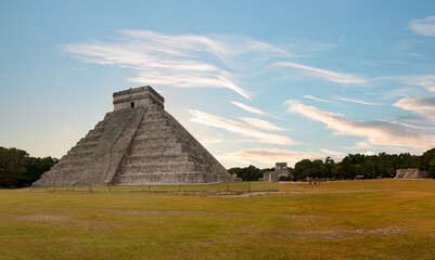 The pyramid of Kukulcan in the Mexican city of Chichen Itza in  the background - Mayan pyramids in Yucatan, Mexico