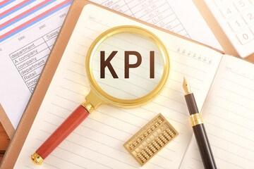 The magnifying glass on the chart is printed with the letters KPI, Performance indicator