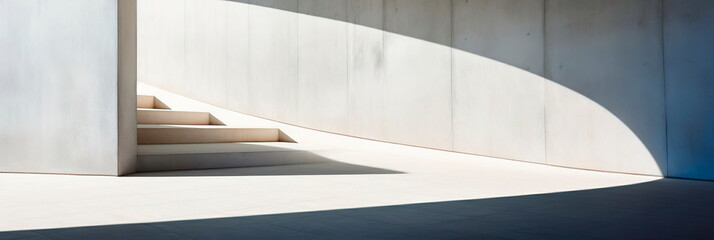 abstract architectural background capturing the interplay of light and shadow on a stark concrete...