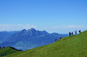 Fototapeta na wymiar Hikers on Top of Mount Rigi