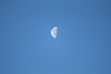 The Third Quarter Moon where the opposite half of the Moon is illuminated.