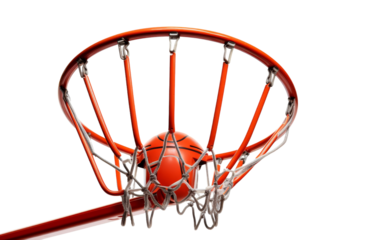 A basketball effortlessly sinks through the net of a basketball hoop