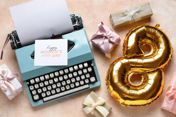 Beautiful composition with vintage typewriter, balloon and postcard for Women's day on pink background