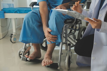 young asian physical therapist working with senior woman on walking with a walker - obrazy, fototapety, plakaty