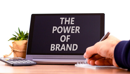 The power of brand symbol. Concept words The power of brand on beautiful black tablet. Beautiful white background. Businessman hand. Calculator. Business the power of brand concept. Copy space. - obrazy, fototapety, plakaty