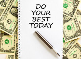 Do your best today symbol. Concept words Do your best today on beautiful white note. Pen. Beautiful dollar bills background. Dollar bills. Business motivational do your best today concept. Copy space