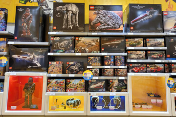 Fototapeta premium Kuala Lumpur, Malaysia - 12 FEB 2024: Lego Star Wars set for sale in the Lego store. Lego is a line of plastic construction toys that are manufactured by The Lego Group company in Denmark.