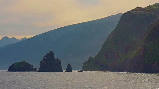 The Ilheus da rib arch, on the coastline of Ribeira da Janela at sunset in Madeira, Portugal