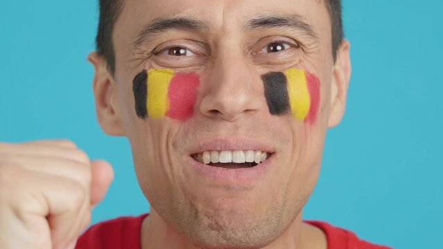 Close up of a man supporting belgian team