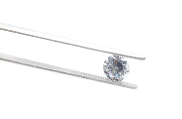Tweezers with beautiful shiny diamond isolated on white
