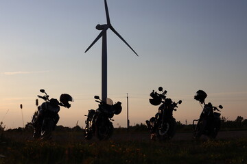 Fototapeta na wymiar silhouette of motorcycle with turbines