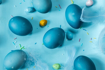 Blue easter eggs on light background