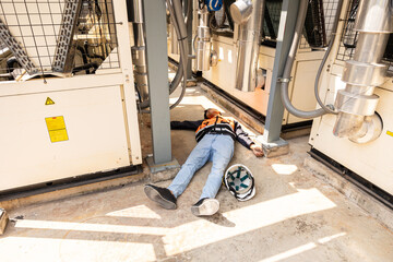 Engineer accident at work site. worker injury from electricity shock or hot weather heat stroke.