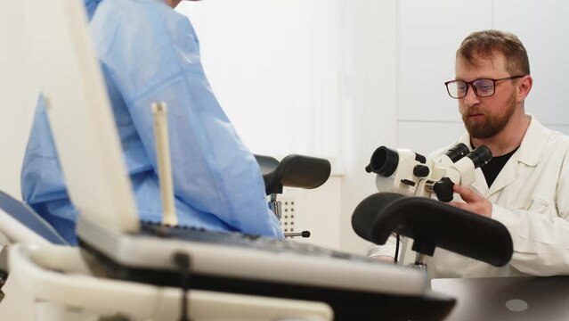 In a gynecologist&rsquo;s office, a doctor consults a young patient. They discuss illness with female patient in hospital, gynecological examination, gynecological consultation.