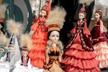 Dolls are dressed in handmade Kazakh women's national costumes. Close-up