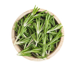 fresh rosemary in wooden plate on isolated white background