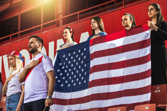 American football / soccer fans singing anthem at the stadium