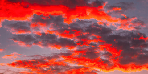 Sunrise Bright Dramatic Sky. Scenic Colorful Sky At Dawn. Sunset Sky Natural Abstract Background In Blue Pink Red Orange Colors.