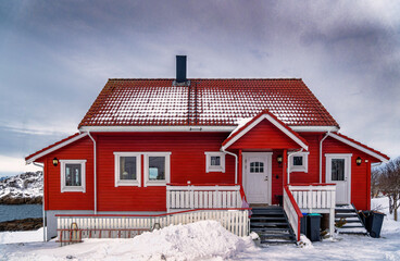 Lofoten Henningsvaer harbor and red homes, Norway