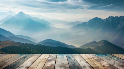 Misty mountains with morning light on wood deck - A serene dawn breaks over mist-covered mountains, seen from a weathered wooden deck viewpoint - obrazy, fototapety, plakaty