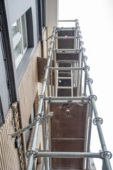 construction of steel scaffolding near building for renovation work,vertical scaffolding forms...