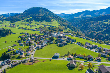 Fototapeta na wymiar Drone Photo of the Village of Hittisau and the Bregenzerwald, State of Vorarlberg, Austria