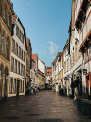 Fototapeta na wymiar Explore the charm of Osnabrück through this collection of travel photos, showcasing its historic architecture, picturesque streets, and vibrant atmosphere. From medieval buildings to modern landmarks.