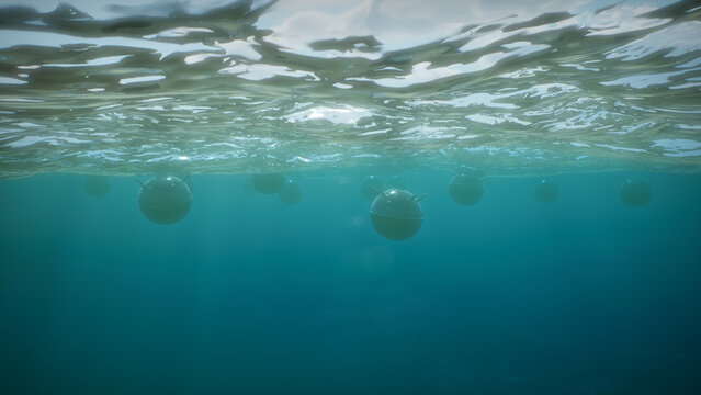 Mines float on the waves in the sea