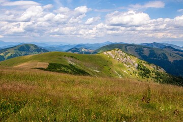 Scenic view of green mountains against the backdrop of a cloudy sky. Big Fatra mountains, Slovakia.