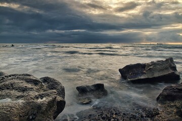 Beautiful shot of the scenic rocky White Cliff Bay of the Isle of Wight on a gloomy day