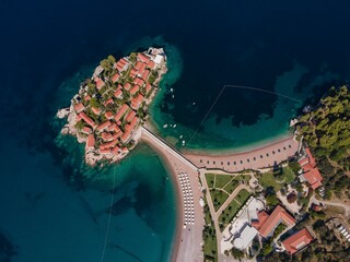 Aerial view of the Sveti Stefan islet in Montenegro. - obrazy, fototapety, plakaty