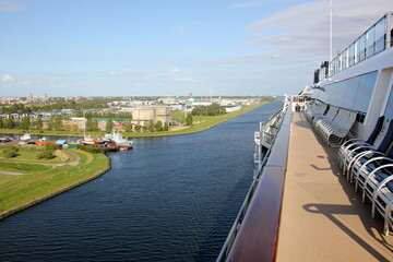 On the upper deck of a large ocean liner.