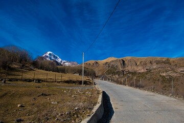 Is an image of a scenic road in the Kazbegi Mountains of Mtskheta-Mtianeti, Georgia