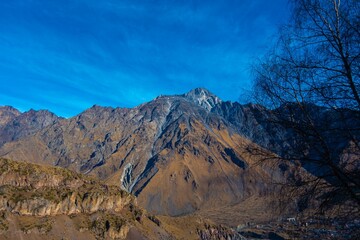 Stepantsminda, Georgia, captures the stunning Kazbegi Mountain region of Mtskheta-Mtianeti