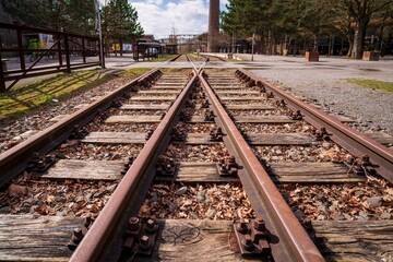 Fototapeta na wymiar Closeup of old aged rusty locomotive tracks outdoors