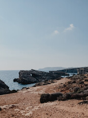 Fototapeta na wymiar The breathtaking beauty of Malta's Blue Lagoon with these stunning photos, the azure waters, rugged cliffs, and radiant sun. Immerse yourself in the idyllic scenery and let these images transport you 