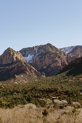 Majestic view of snow-covered mountain peaks against a clear sky