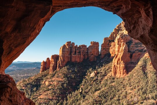 Mesmerizing view of the iconic red rock formations of Sedona, Arizona against a bright blue sky