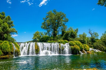 Obraz premium Scenic view of the Kocusa Waterfall in Bosnia and Herzegovina.