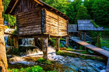 Scenic view of the flowing Jajce watermills in Jezero, Bosnia and Herzegovina - obrazy, fototapety, plakaty