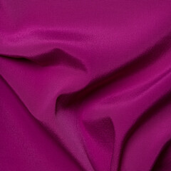 Background texture, pattern. Satin is pink. tissue, textile, cloth, fabric, material, texture. photo studio