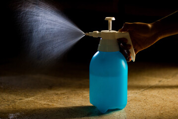 The spray is squeezed to release water