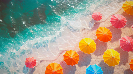 Aerial view of colorful umbrella on sand beach