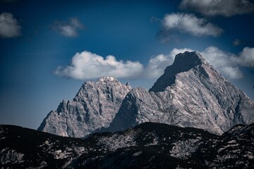 Stunning aerial shot of the majestic Alps, featuring a beautiful mountain range