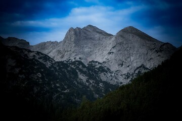 Stunning aerial shot of the majestic Alps, featuring a beautiful mountain range