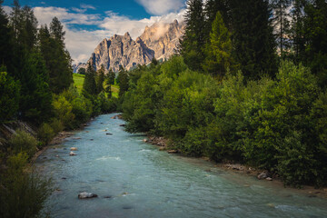 Boite river and high mountains at sunset, Dolomites, Italy - 772315393