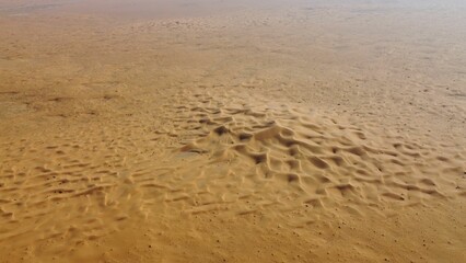 Closeup of a beautiful landscape of a desert on a sunny, hot day in Saudi Arabia