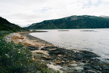 Fototapeta na wymiar lake in Bahia Lapataia amidst mountains at Tierra del Fuego