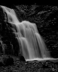 Scenic view of a waterfall cascading down the rocks