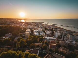 Aerial view of the stunning sunset over the Gabicce Mare and Romagna coast of Italy.